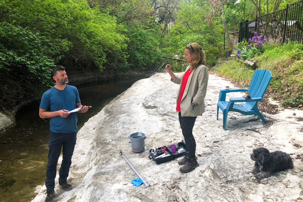 Tony Adler, Texas Stream Team volunteer, discusses his findings with Sherry Shaffer Smith whose childhood home is across from the obliterated creek bank. Photo by Kristi Kerr Leonard.