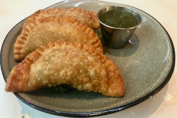 Sweet Potato Empanadas were enhanced by corn and black beans. Photo by Amy Martin.