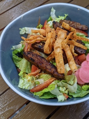 Vegan steak in salad