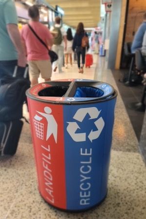 Dual trash cans at Dallas Love Field.