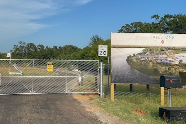 Sign depicts planned development underway at the former Fairfield Lake State Park by Todd Interests despite the state's intentions to seize the property. Photo by Misti Little.