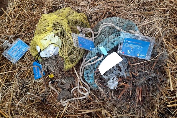 A bio-based polymer test bag that has been mostly degraded. Photo by Marshall Hinsley.