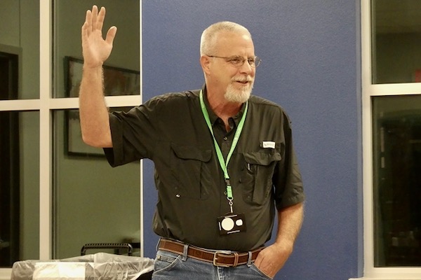 Fort Worth Nature Center manager Rob Denkhaus trys to quell fears of residents about alligators. Photo by Michael Smith. 