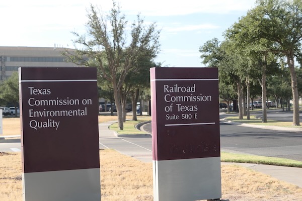 Railroad Commission of Texas (RRC) and Texas Commission on Environmental Quality (TCEQ) district offices occupy the same office building in Midland, Texas. The TCEQ now oversees permitting for produced water discharges in Texas. Credit: Martha Pskowski/Inside Climate News.