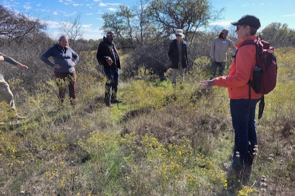 Suzanne Tuttle teaches a group about the Fort Worth Prairie during a Prairie Seekers class. Photo by Amy Martin.