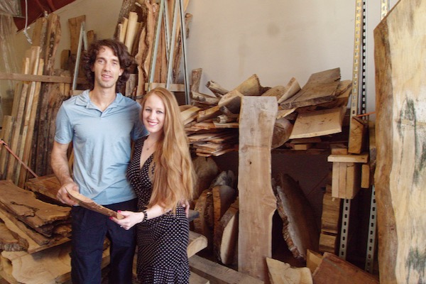 Caleb and Kelly Geer, owners of Urban Tree Merchants sell milled wood and home decor made from residential trees at their store in Arlington. Photo by J.G. Domke.